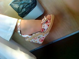 Attractive mature feet in shoes CANDID